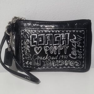 Coach Poppy Black & Silver Graphic Wristlet Good Cond